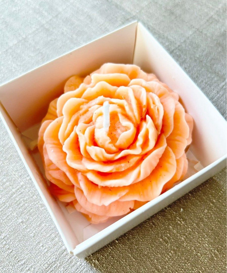 Decorative Peony Candle (Category: Other Home Decor) located in Quezon City. Submitted by hygge.elements (Listing ID 1460720604, Image 3). Description: - Handcrafted peony-shaped candle - Beautiful pastel color with detailed petals - Arrives in a white gift box, tied with ribbon - Ideal for home decor or as a thoughtful gift - Creates a lovely ambiance - Available colors: peach, lavender & light green.