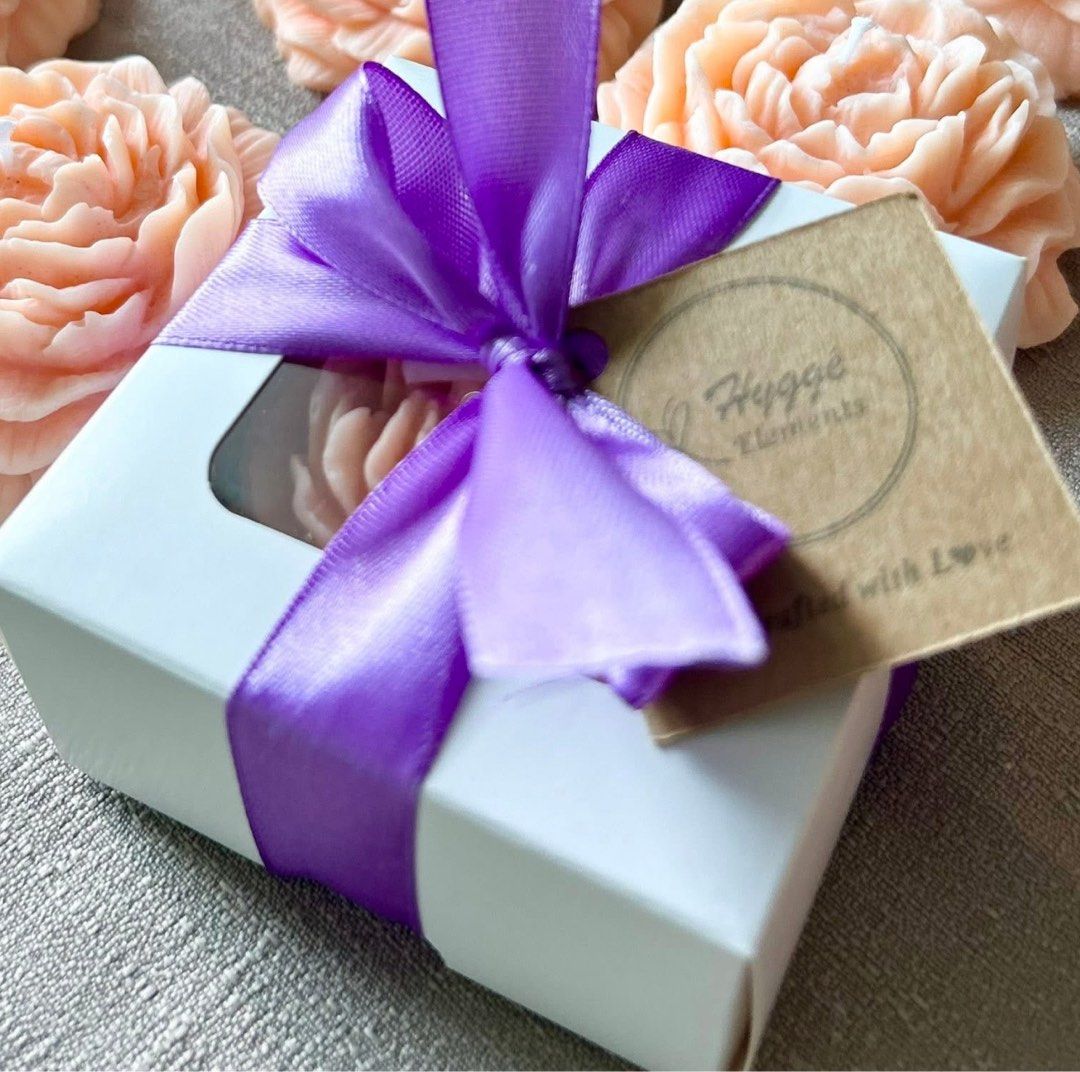 Decorative Peony Candle (Category: Other Home Decor) located in Quezon City. Submitted by hygge.elements (Listing ID 1460720604, Image 1). Description: - Handcrafted peony-shaped candle - Beautiful pastel color with detailed petals - Arrives in a white gift box, tied with ribbon - Ideal for home decor or as a thoughtful gift - Creates a lovely ambiance - Available colors: peach, lavender & light green.