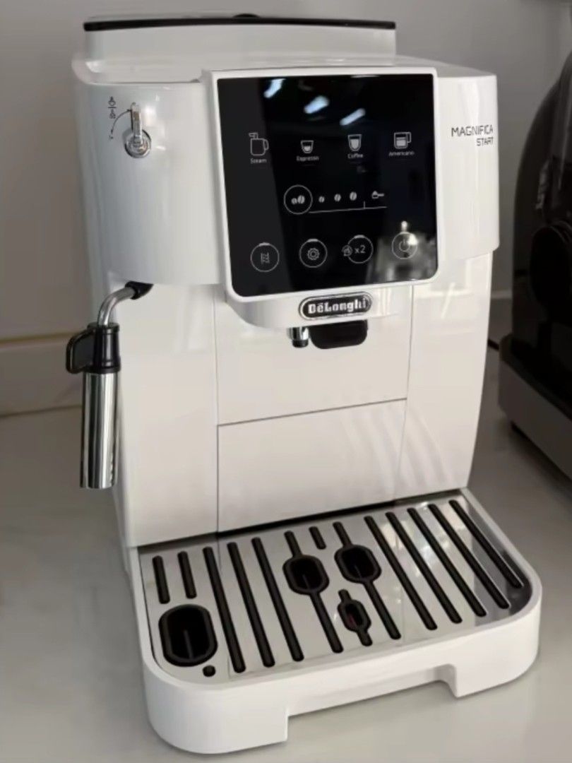 DeLonghi Magnifica Start Automatic Coffee Machine White (Category: Coffee Machines & Makers) located in Cainta. Submitted by rj.serrano (Listing ID 1460897400, Image 3). Description: White DeLonghi Magnifica Start coffee machine. Makes espresso, coffee, and americano. Has a steam wand for milk. Easy to use touch screen. Makes great coffee at home. Built-in Grinder: Integrated conical steel burr grinder with adjustable settings. One-Touch Recipes: