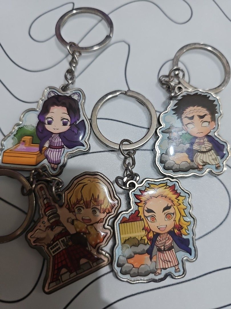 Demon Slayer Chibi Keychain Set (Category: Designer & Blind Box Toys) located in Manila. Submitted by zen_francis (Listing ID 1460763716, Image 1). Description: - Set of 4 Demon Slayer keychains - Features cute chibi versions of popular characters - Ideal for fans of the anime - Perfect for attaching to bags, keys, or backpacks.