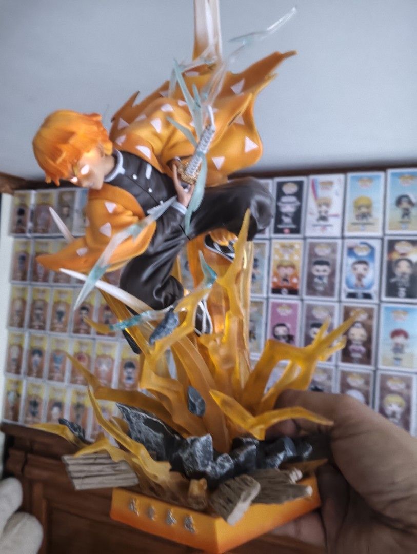 Demon Slayer Zenitsu Agatsuma Figure (Category: Figurines & Statues) located in Cainta. Submitted by xtiant (Listing ID 1458419977, Image 3). Description: - Demon Slayer: Kimetsu no Yaiba figure - Character: Zenitsu Agatsuma - Condition: BIB - Box condition: Minor wear - Features: Dynamic pose with lightning effects (eyes are lighting as well) - Ideal for: Any Demon Slayer fan.
