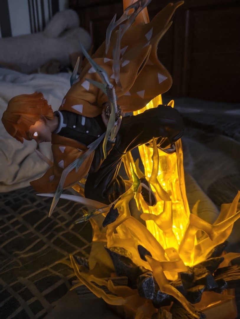 Demon Slayer Zenitsu Agatsuma Figure (Category: Figurines & Statues) located in Cainta. Submitted by xtiant (Listing ID 1458419977, Image 2). Description: - Demon Slayer: Kimetsu no Yaiba figure - Character: Zenitsu Agatsuma - Condition: BIB - Box condition: Minor wear - Features: Dynamic pose with lightning effects (eyes are lighting as well) - Ideal for: Any Demon Slayer fan.