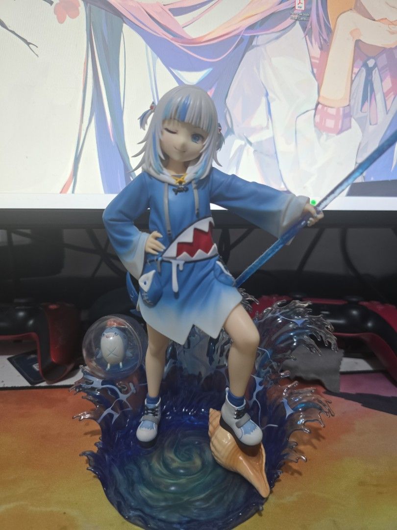 Design Coco Gawr Gura 1/7 Scale (Category: Figurines & Statues) located in Manila. Submitted by j_carlo_c (Listing ID 1460894385, Image 2). Description: - RARE Gawr Gura figure from Hololive - Includes her signature trident - Comes with a cool water effect base - Previously displayed with care - With Original Box.
