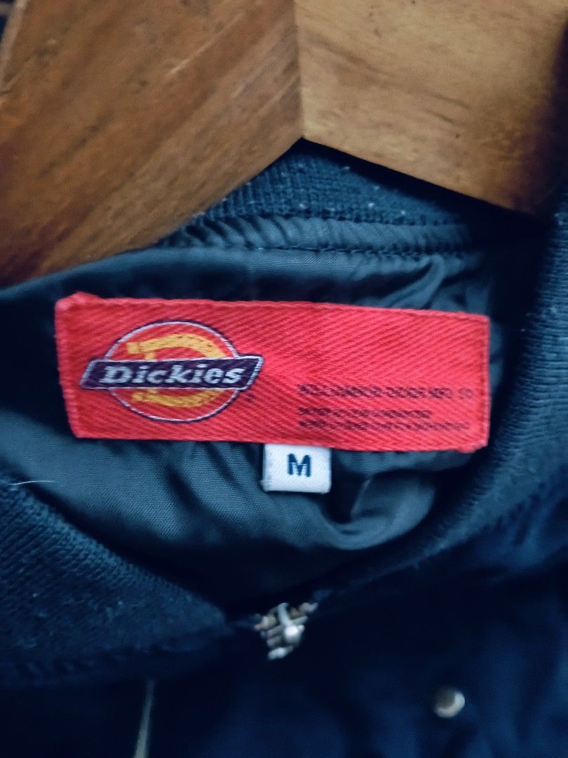 Dickies Bomber Jacket Navy Blue Size M (Category: Coats, Jackets and Outerwear) located in Caloocan City. Submitted by arielagost83627 (Listing ID 1460796657, Image 3). Description: - Navy blue Dickies bomber jacket - Size: Medium (M) - Classic zip-up front - Convenient pockets - Signature Dickies logo prominently displayed on the back - Ideal for casual everyday wear Color Rate: 9.8/10 Dimes: 24x26 Issue: See Last Pic Excellent Condition.