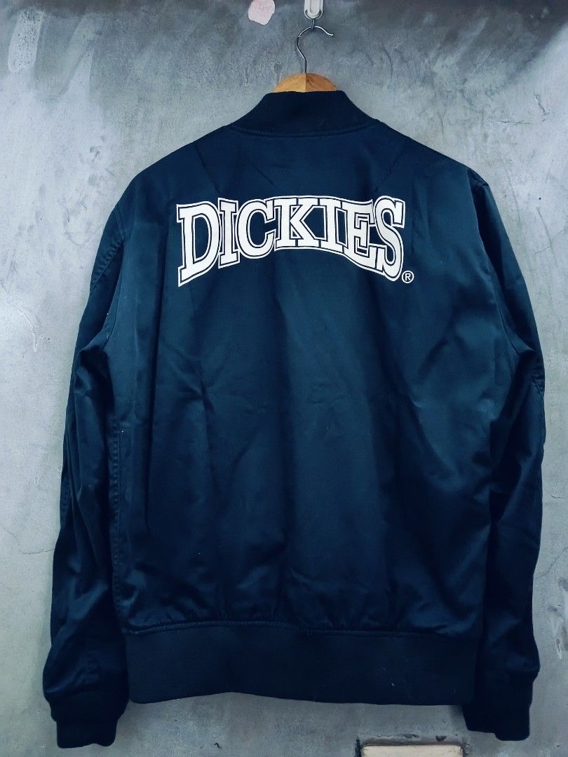 Dickies Bomber Jacket Navy Blue Size M (Category: Coats, Jackets and Outerwear) located in Caloocan City. Submitted by arielagost83627 (Listing ID 1460796657, Image 1). Description: - Navy blue Dickies bomber jacket - Size: Medium (M) - Classic zip-up front - Convenient pockets - Signature Dickies logo prominently displayed on the back - Ideal for casual everyday wear Color Rate: 9.8/10 Dimes: 24x26 Issue: See Last Pic Excellent Condition.