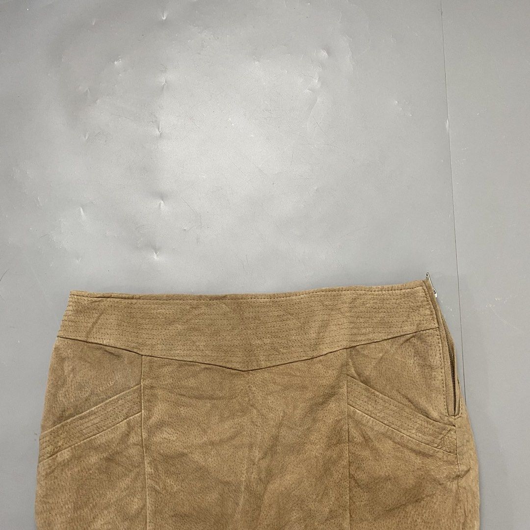 Dictionary 🌸 | Brown Leather Mini Skirt (Category: Skirts) located in Bulacan. Submitted by orc.ph (Listing ID 1460814278, Image 2). Description: Dictionary 🌸 | Brown Leather Mini Skirt Material Used: Polyester - Brown - Leather - Mini Skirt - Multi Pockets - Zipper Closure - Semi Formal - Casual - Streetwear - Y2K ‎-Size: L ‎-Waistline: 30" ‎-Length: 15" ‎Pristined Condition. No Visible Flaws ‎ No Issue At All ‎ ‎ ‎ ‎⚠️Note: For Inspo lang po 