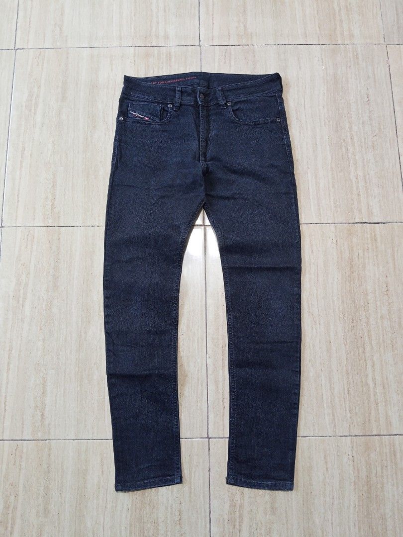 Diesel Industry Black Denim Jeans (Category: Jeans) located in Glan. Submitted by cpaharodde48008 (Listing ID 1460750268, Image 2). Description: - Brand: Diesel Industry - Color: Black - Style: Classic five-pocket - Fit: Straight leg - Closure: Button and zip fly - Ideal for: Everyday wear - Condition: Please check photos for details.