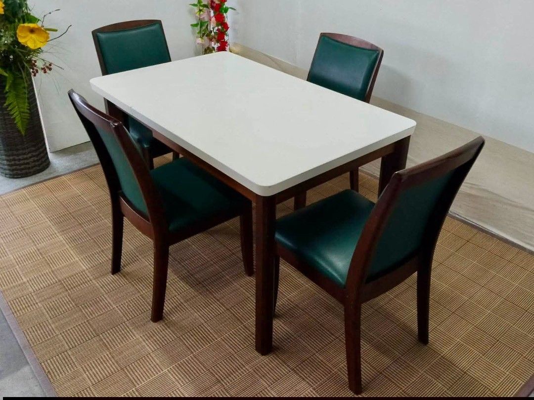 Dining Set (Category: Tables & Sets) located in Meycauayan. Submitted by marygracecasimiro (Listing ID 1460760325, Image 3). Description: SOLID WOOD Extendable Table White Duco Finish Top Solid Wood Leather Chairs 47”L x 30”W x 27”H 17”L x 15”W x 31”H Php 20,500♥️.