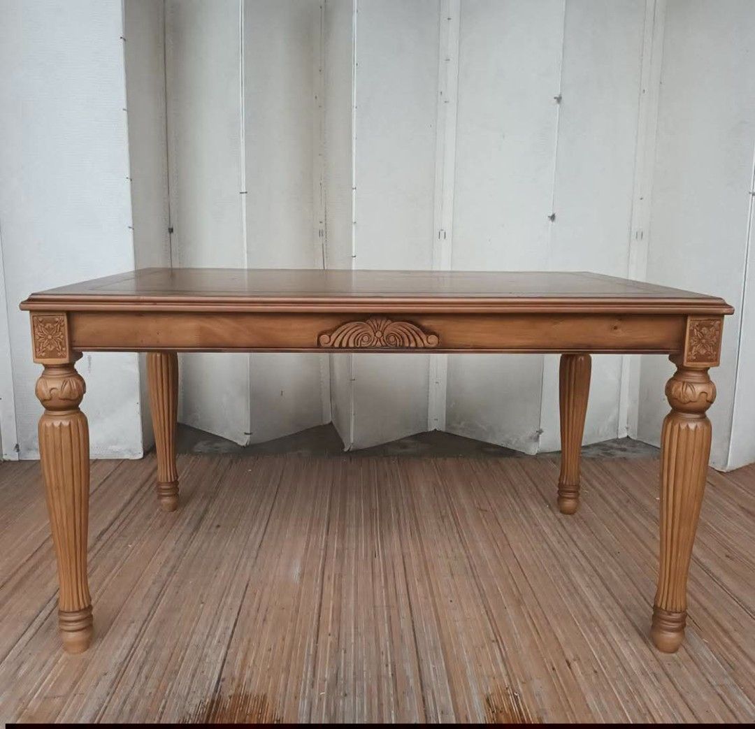 Dining Table (Category: Tables & Sets) located in Meycauayan. Submitted by marygracecasimiro (Listing ID 1460757641, Image 2). Description: Elegant Solid Wood Dining Table Classic 6-Seater / Intricate Carvings L52.5 x W33.5 x H29.5 Price: 11,500♥️.