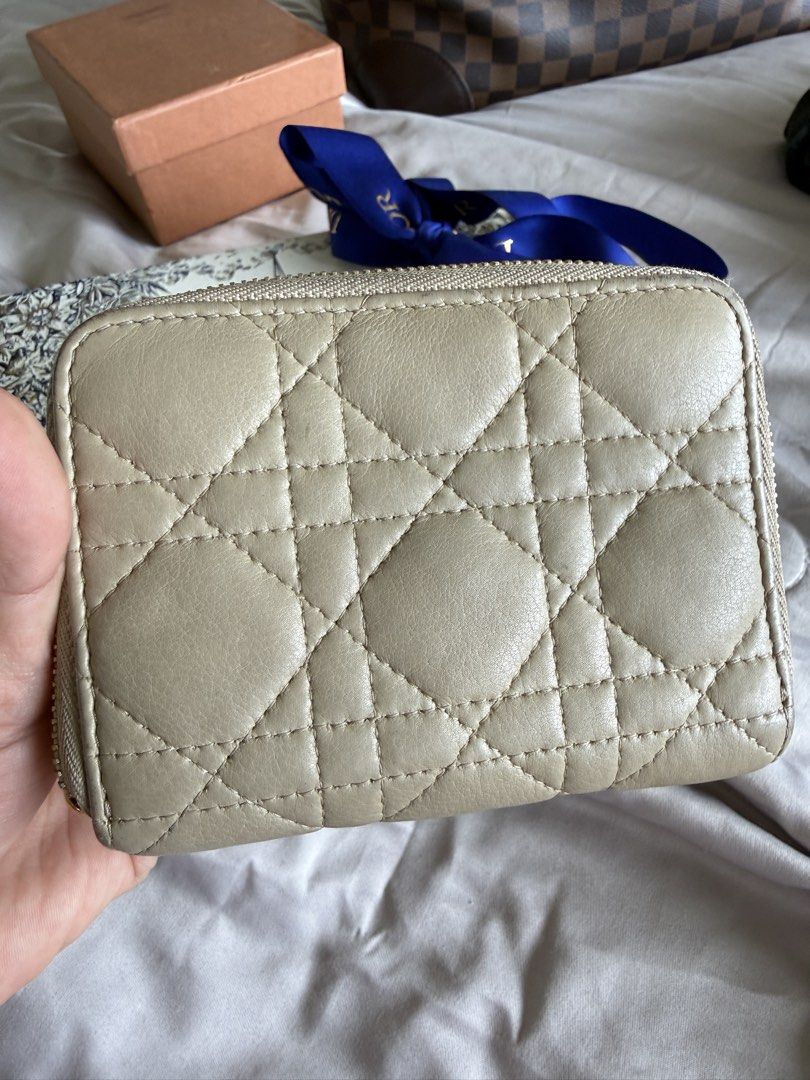 Dior Caro Wallet in Beige (Category: Luxury Bags & Wallets) located in Calamba. Submitted by mom2girls (Listing ID 1460765907, Image 2). Description: Beautiful neutral color. Can fita lot of bills, cards and coins. Best thing about this compact wallet is that it fits in small bags. So for those with Chanels, Celine nanos, Dior bags, Gucci marmonts, this is the perfect wallet to buy. Shipping via LBC only. SF c/o Buyer..