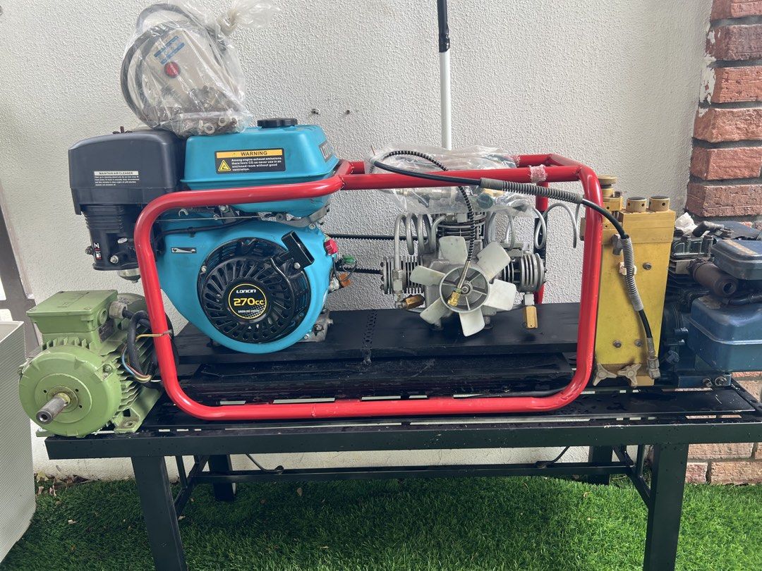 Diving Compressor (Category: Other Sports Equipment and Supplies) located in Shah Alam. Submitted by fayed_64 (Listing ID 1460755147, Image 3). Description: Junior Diving Compressor. - Engine new 270cc (1time used) petrol. - ⁠Bauer Compressor running good condition. - ⁠service by Jun 2026. - ⁠Charging @ 20min per tank. - ⁠Electric engine (spare) - ⁠Petronal engine (spare) - ⁠charging adapter (new) Location: Elmina West Seksyen U16, Shah Alam. Loo