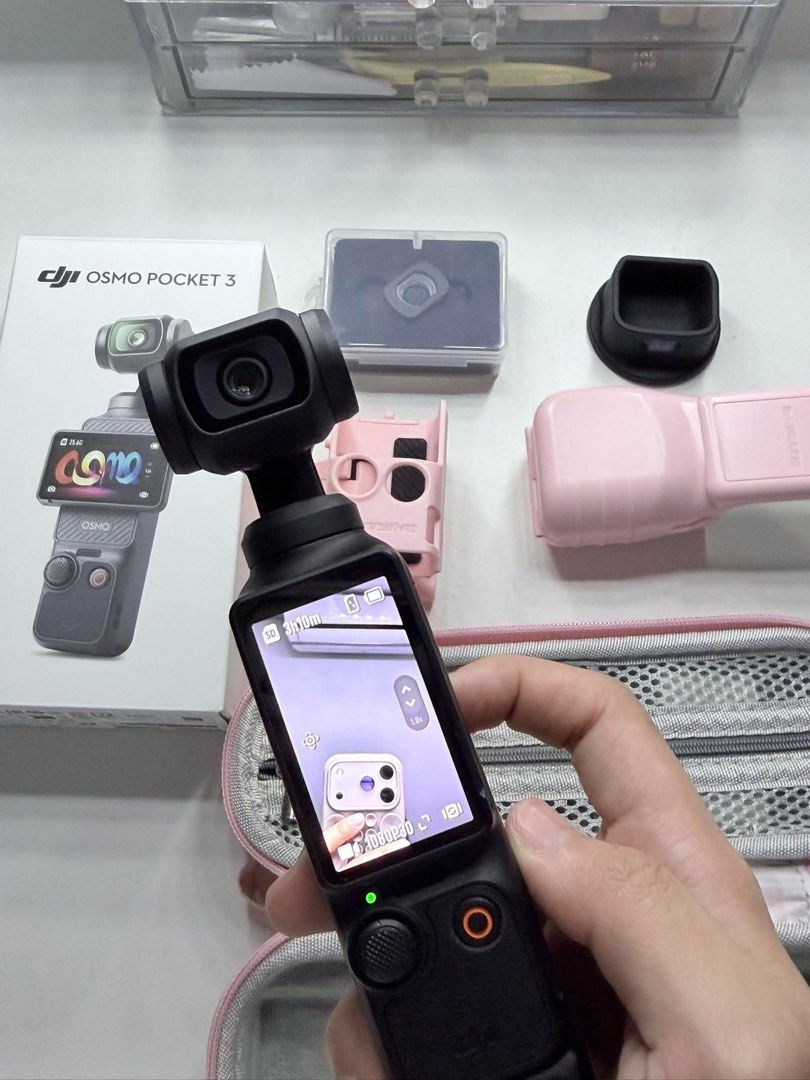 DJI Osmo Pocket 3 (Category: Cameras) located in San Fernando. Submitted by royaleagle-778ce1 (Listing ID 1460869830, Image 2). Description: Selling my DJI Osmo Pocket 3 Standard Combo ♡ ✨ 5 months old only ✨ Gently used and well taken care of ✨ In good condition / no functional issues ✨ Perfect for vlogs, travel, content creation, and everyday filming ✨ Smooth stabilization + great video quality ✨ Complete with original box and inclusions 📦 Inc