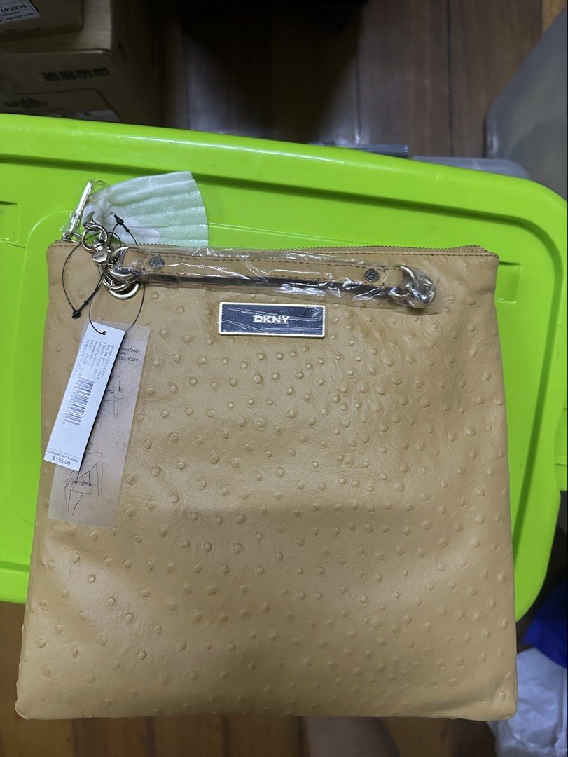 DKNY ostrich-embossed leather Shoulder Bag (Category: Cross-body Bags) located in Manila. Submitted by declutteringlot (Listing ID 1460895447, Image 1). Description: .