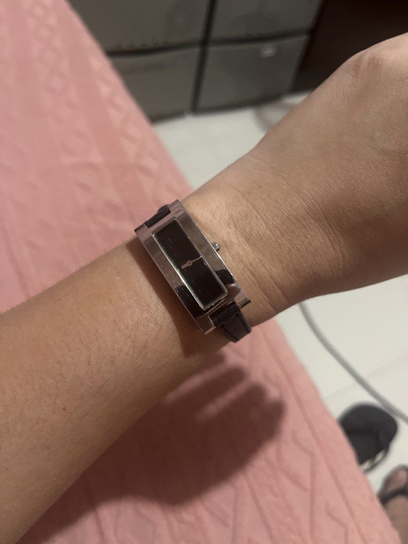 DKNY Rectangular Watch with Black Leather Strap (Category: Women's Watches) located in Cabanatuan. Submitted by carou99645 (Listing ID 1460858575, Image 1). Description: - DKNY watch - Rectangular black face - Silver-tone casing - Black leather strap - Minor scratches on back casing - Still a nice piece to wear.