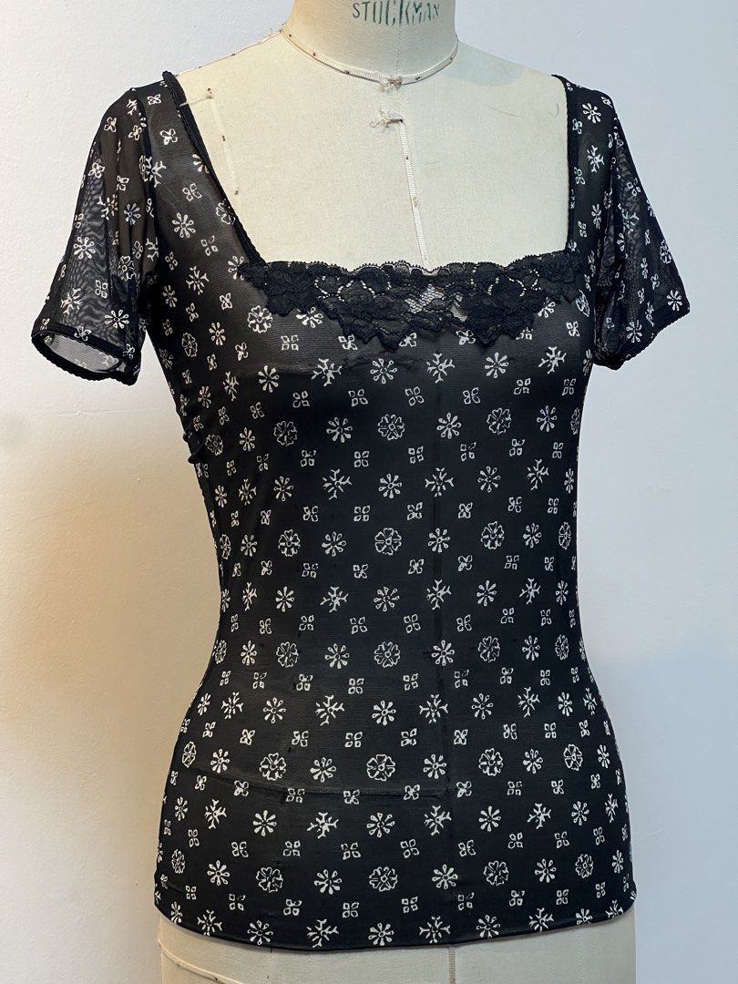 Dolce & Gabbana stretch top (Category: Luxury Apparel) located in Quezon City. Submitted by raccoonfur (Listing ID 1460802608, Image 3). Description: Dolce & Gabbana lace princess neckline stretch top. Very Lindsay Lohan. Great condition. Flat measurements:(unstretched) Armpit to armpit 42.5cm Waist 35cm Hips 43cm Shoulders 35cm Length 62cm Sleeve length 17cm.