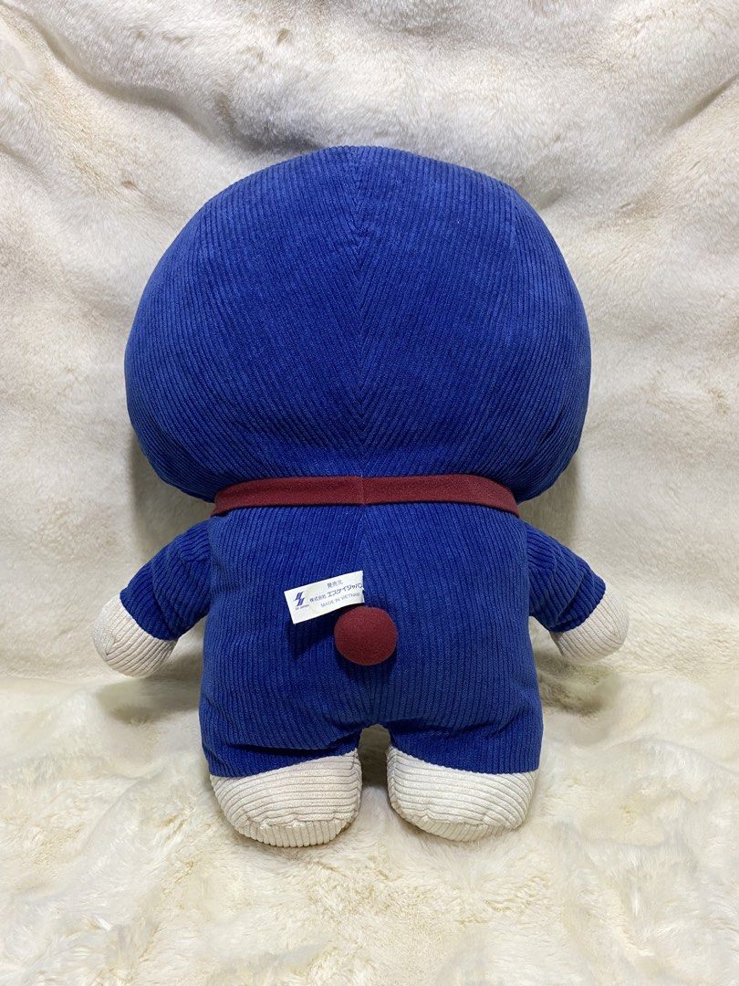 Doraemon Corduroy Plush Toy (Category: Plushies & Soft Toys) located in Kalibo. Submitted by ollie_stuffshop (Listing ID 1460913235, Image 3). Description: 43cm x 34cm Before you send your inquiries: ❗️Last Price is already posted ❗️Manage your expectations, WYSIWYG ❗️May need washing ❗️Dropoff is every Wednesday & Sunday - Super cute Doraemon plushie - Made with soft corduroy material - Classic red collar and bell included - Perfect for Doraemon