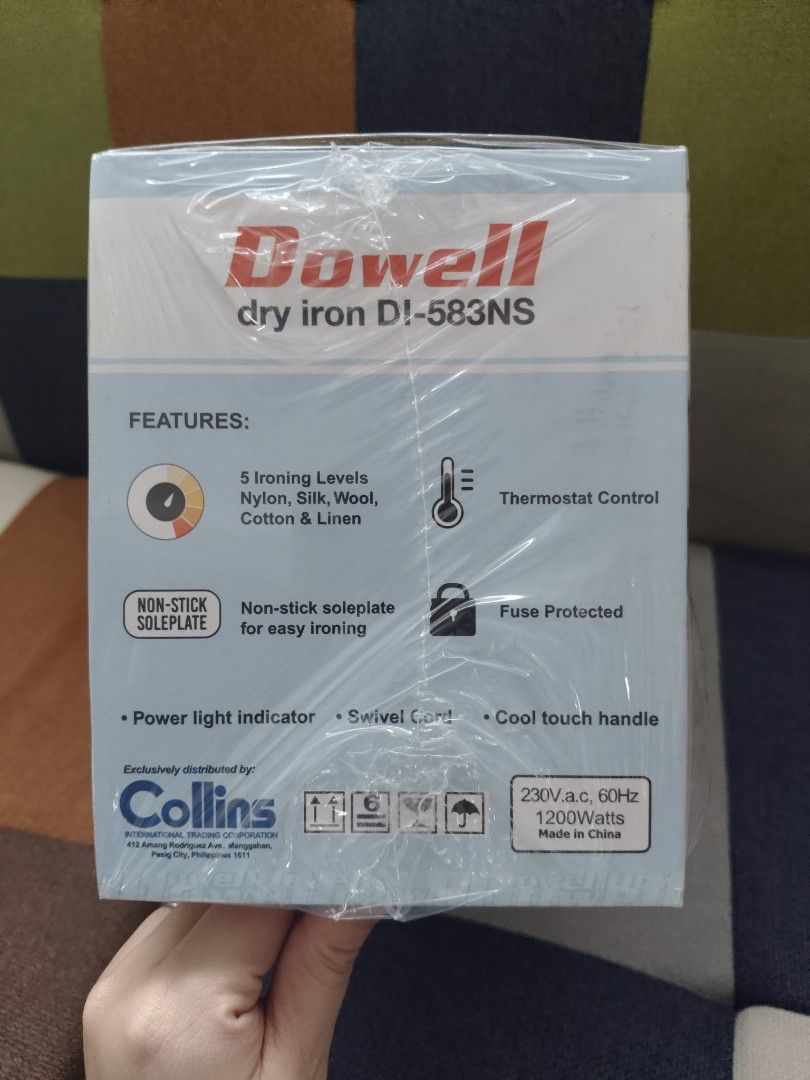 Dowell dry iron (Category: Irons & Steamers) located in Rizal. Submitted by anyadrea (Listing ID 1460771881, Image 2). Description: - Brand: Dowell - Model: DI-583NS - Type: Dry Iron - Features: 5 Ironing Levels (Nylon, Silk, Wool, Cotton, Linen) - Soleplate: Non-stick for easy ironing - Safety: Fuse Protected - Control: Thermostat Control - Convenience: Swivel Cord, Cool Touch Handle, Power Light Indicator - Power: 1200 Watts.