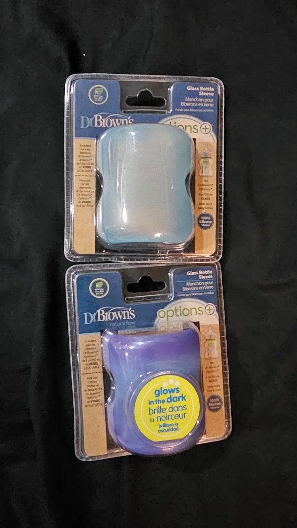 Dr. Brown's Options+ Glass Bottle Sleeves (2 pcs) (Category: Breastfeeding & Bottle Feeding) located in Quezon City. Submitted by closetjordy (Listing ID 1460897929, Image 3). Description: bought from amazon - Set of 2 Dr. Brown's Options+ Glass Bottle Silicon Sleeves - Includes 1 light blue sleeve and 1 purple glow-in-the-dark sleeve - Made of 100% silicone - Designed for Dr. Brown's Options+ 5oz/150ml wide-neck glass bottles - Provides excellen