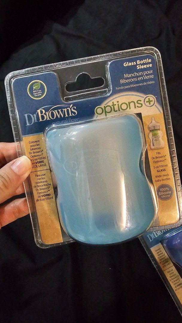 Dr. Brown's Options+ Glass Bottle Sleeves (2 pcs) (Category: Breastfeeding & Bottle Feeding) located in Quezon City. Submitted by closetjordy (Listing ID 1460897929, Image 2). Description: bought from amazon - Set of 2 Dr. Brown's Options+ Glass Bottle Silicon Sleeves - Includes 1 light blue sleeve and 1 purple glow-in-the-dark sleeve - Made of 100% silicone - Designed for Dr. Brown's Options+ 5oz/150ml wide-neck glass bottles - Provides excellen