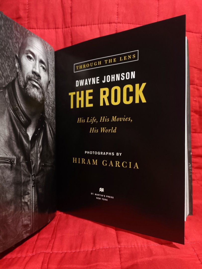 Dwayne Johnson The Rock Through The Lens Book (Category: Textbooks) located in Manila. Submitted by krishna_ayanami (Listing ID 1460905449, Image 2). Description: - "The Rock" biography book by Hiram Garcia. - Covers Dwayne Johnson's life, movies, and world. - Packed with photos and anecdotes about his career and personal life. - Features exclusive images with co-stars Ryan Reynolds and Kevin Hart. - An ideal coffee table book for any fan of Dway