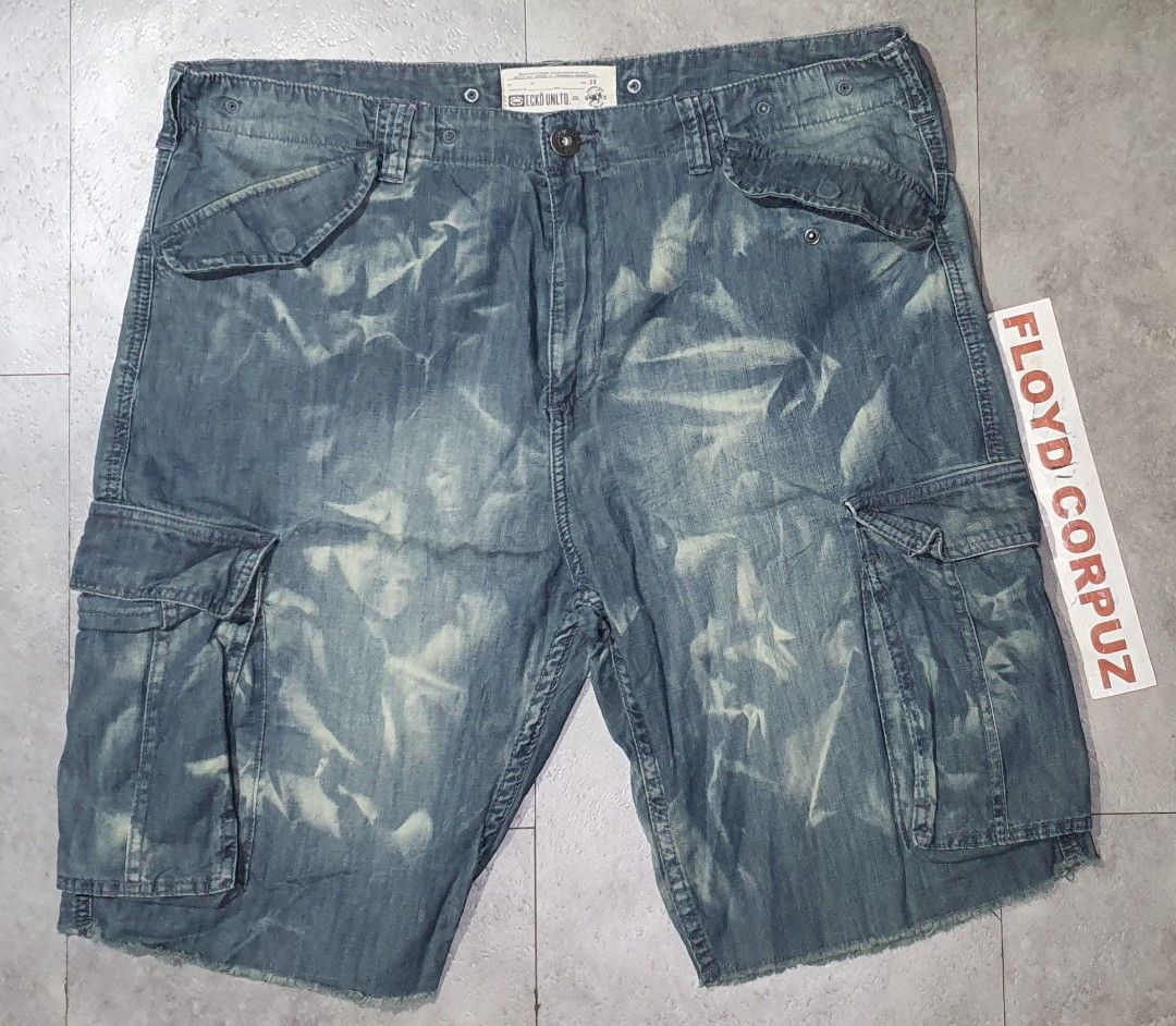 Ecko Unltd. Denim Cargo Shorts Size 38 (Category: Shorts) located in Laoag. Submitted by floydg_corpuz22 (Listing ID 1460819912, Image 1). Description: Ecko Unltd. Soft denim cargo shorts, size 38. Blue wash with bleached effect and frayed hem. 100% cotton, perfect for casual wear. Ecko 38 x 21.5 Vgood 280+sf.