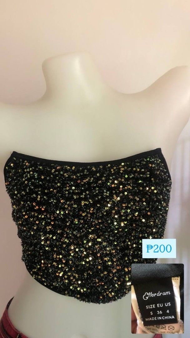 Effordram Sequin Tube Top (Category: Sleeveless) located in Manila. Submitted by anne_available (Listing ID 1460725754, Image 1). Description: Effordram Strapless Sequin Tube Top Size: S | Price: ₱200 Condition: Never Used Details: High-shine metallic flip sequins (black/gold shift) with comfy lining..