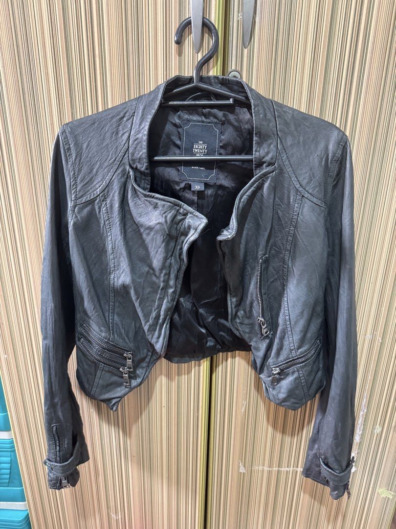 Eighty Twenty Two Crop Leather Jacket (Category: Coats, Jackets and Outerwear) located in Manila. Submitted by chie04_875 (Listing ID 1460729255, Image 2). Description: -Black leather cropped jacket - SIZE: XS -In good condition - No issues - From The Eighty Twenty - Zip details on pockets and sleeves - Asymmetrical zip front closure - Collar can be worn up or down - Ideal for layering.