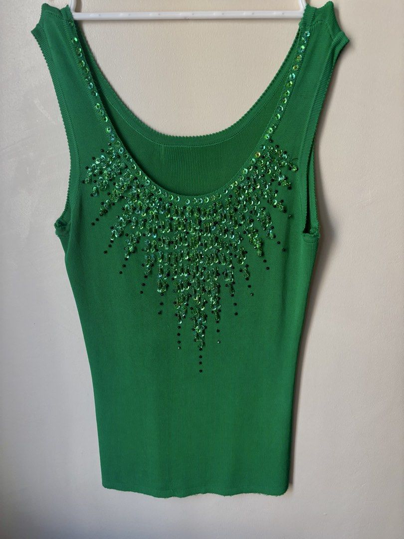 Emerald Green Sequin Beaded Embellished Ribbed Tank Y2K Statement Top (Category: Sleeveless) located in Cebu City. Submitted by joy_finds (Listing ID 1460767611, Image 1). Description: - can fit xs-s - thrifted; NO when worn - Payment via gcash qr - Delivery via J&T; SF shoulder by buyer .