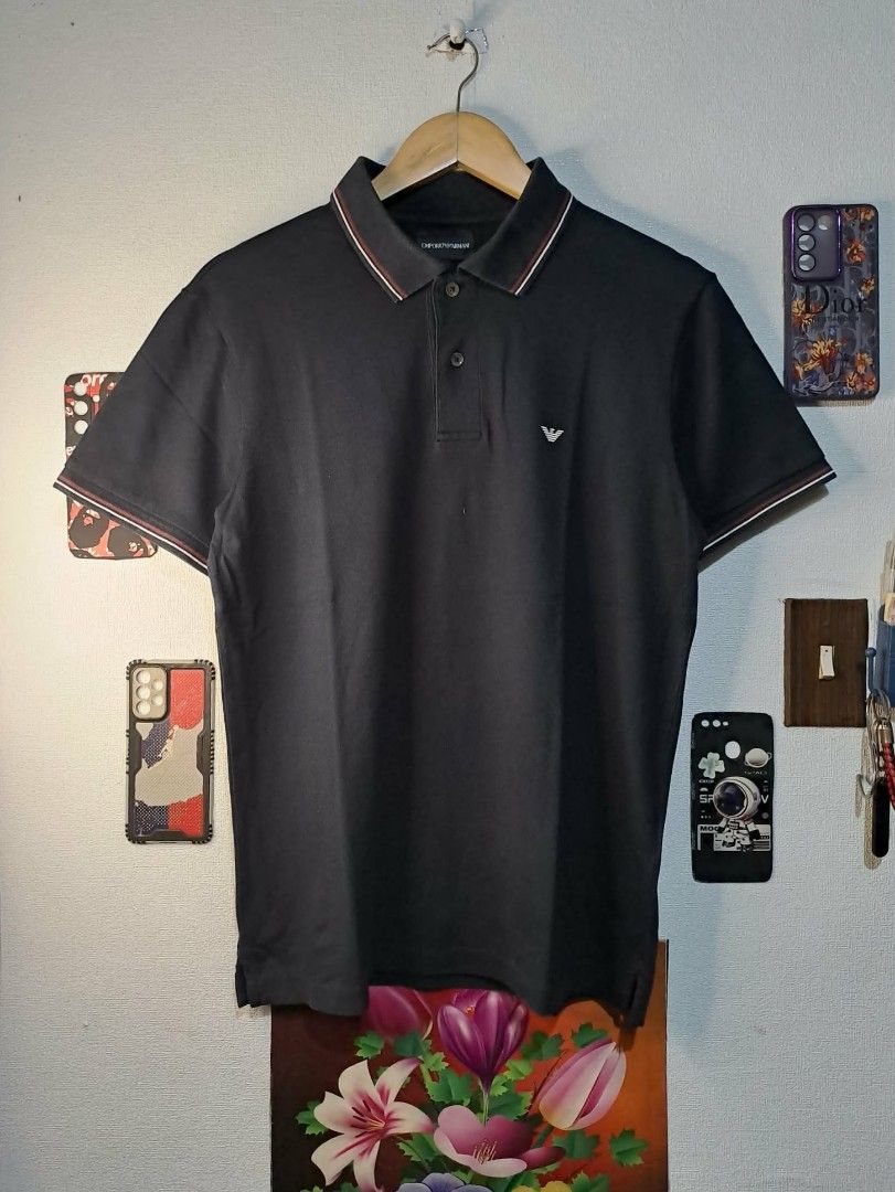 Emporio Armani (Category: Tshirts & Polo Shirts ) located in Quezon City. Submitted by yaseen73 (Listing ID 1460773795, Image 1). Description: Authentic Emporio Armani Stretchy Pique Polo Shirt Minimalist Embosed Eagle Logo Trim Colar Neck Maroon and White Color Wearing Size : Large on Tag Dimensions : Please Refer to the Photo Color Rate : 9.5/10 With Minimal Sign of Usage Condition : 4.9/5 or Best Offer Courier : J & T Lalamove MOP : G C A S H 
