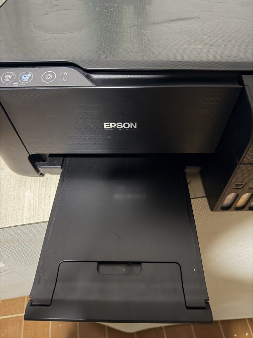 Epson L3210 (Sublimation Converted) (Category: Printers, Scanners & Copiers) located in Taguig. Submitted by leiyyyy (Listing ID 1460762886, Image 3). Description: - Epson L3210 (bought last Dec 2025) with 400+ total pages printed palang - Bought around 9k+ - Converted to sublimation printer - No box, nabasa po siya. - Can be used for sublimation print, pa clean lang po or can be used for dye/pigment print ipacoord lang po sa technician Rfs: Di n