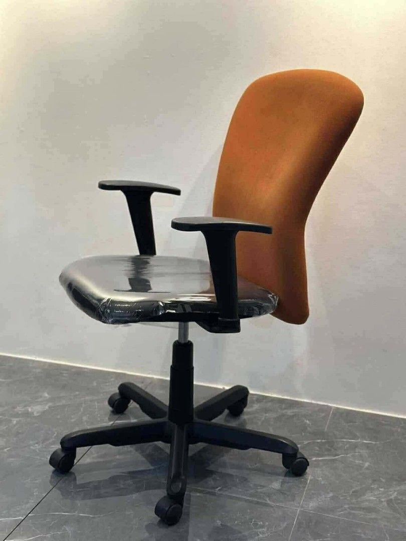 Ergonomic Office Chair with Orange Backrest (Category: Chairs) located in Manila. Submitted by Persephone13 (Listing ID 1460765139, Image 2). Description: Orange fabric office chair with adjustable height and armrests. Seat still has protective plastic. Rolls smoothly. Perfect for your office or home..