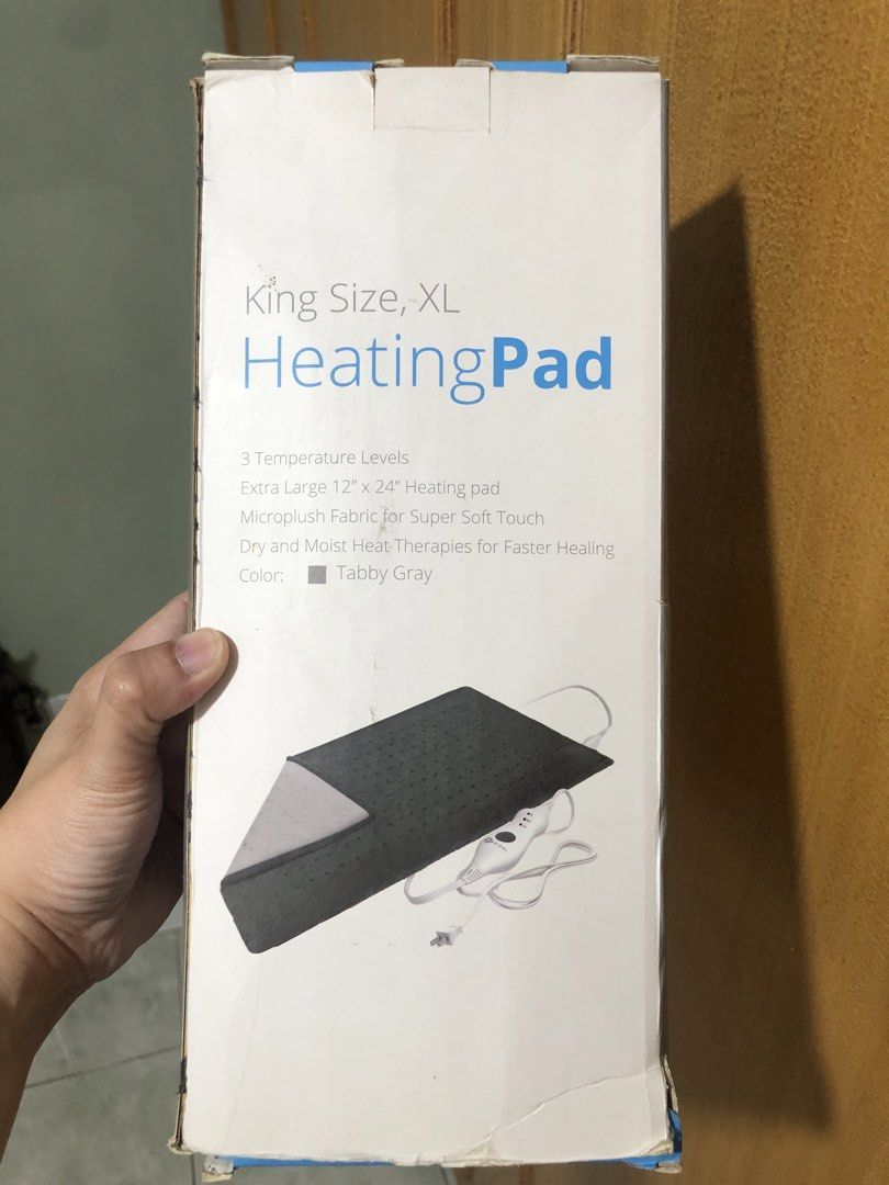 Extra Large King Size Heating Pad - Dry/Moist Therapy (Category: Massage Devices) located in Paranaque City. Submitted by shopnichoppy (Listing ID 1460722880, Image 2). Description: - King size heating pad (12"x24") - Perfect for back, neck, and shoulder pain relief - Offers dry or moist heat therapy - 3 adjustable temperature levels - 2-hour auto shut-off for safety - Extra-long cord for convenience - Made with super soft microplush fabric - Sty