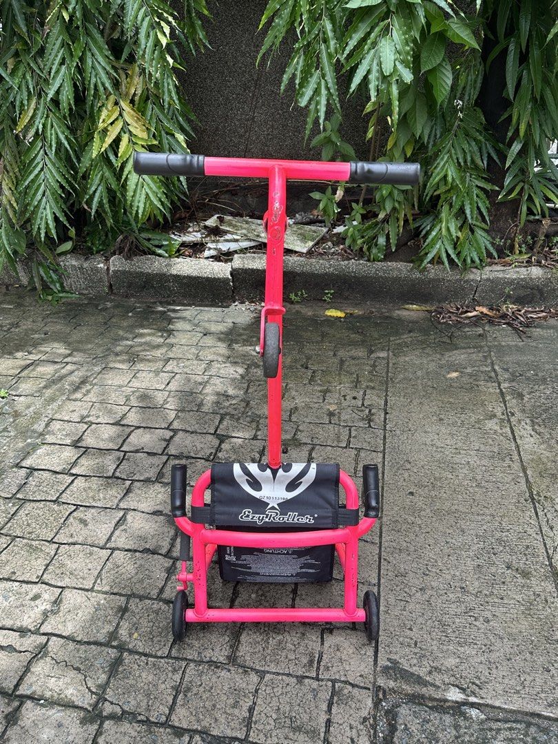EzyRoller (Category: Bicycles) located in Quezon City. Submitted by thepinkclosett (Listing ID 1460741409, Image 3). Description: - Brand: EzyRoller - Color: Pink (repainted) - Type: Ride-on toy - Features: Easy to maneuver, fun for outdoor play - Comes with extension.