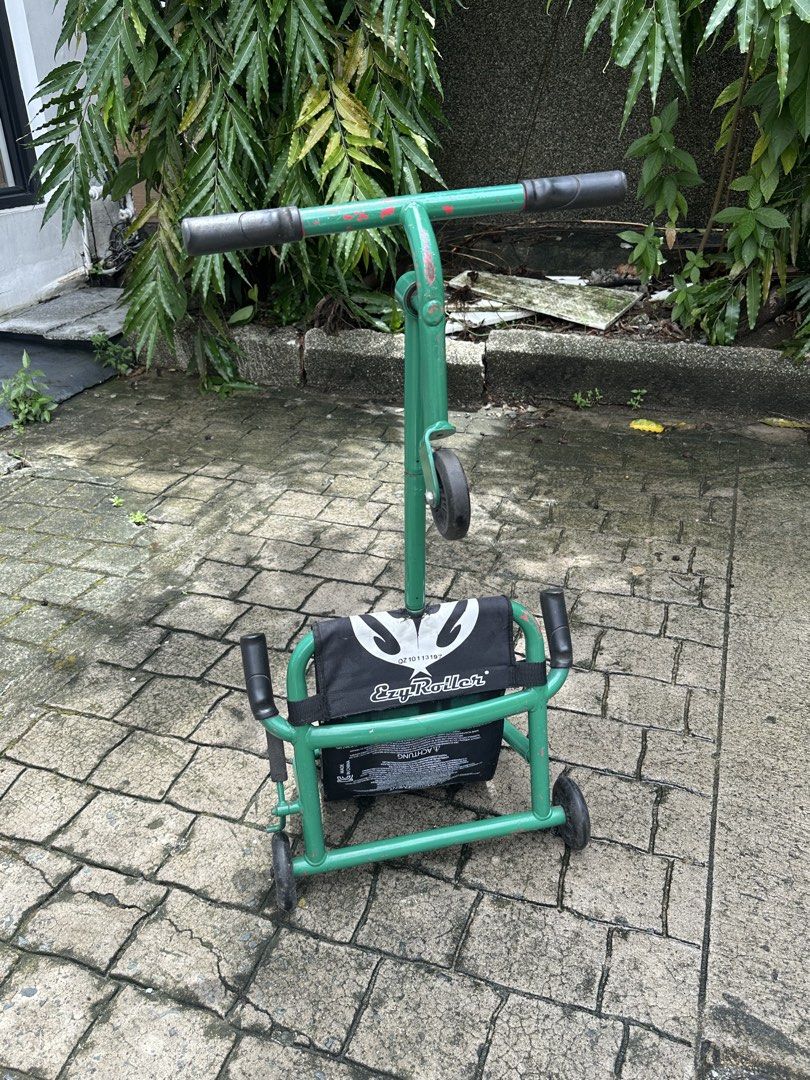 EzyRoller (Category: Bicycles) located in Quezon City. Submitted by thepinkclosett (Listing ID 1460741437, Image 3). Description: - Brand: EzyRoller - Color: Green (repainted) - Type: Ride-on toy - Features: Easy to maneuver, fun for outdoor play - Comes with extension .
