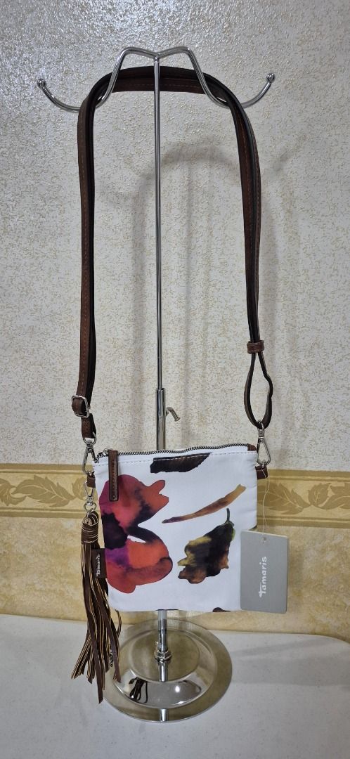 F12-450 Tamaris Forest Mini Sling Bag (Category: Cross-body Bags) located in Valenzuela. Submitted by dailyhappyfinds (Listing ID 1460787036, Image 3). Description: BRAND: Tamaris -Brand new with tag -Sling bag -With minimal stain -Please check last photo for details *Mall pullout/ factory pullout, please manage your expectations.