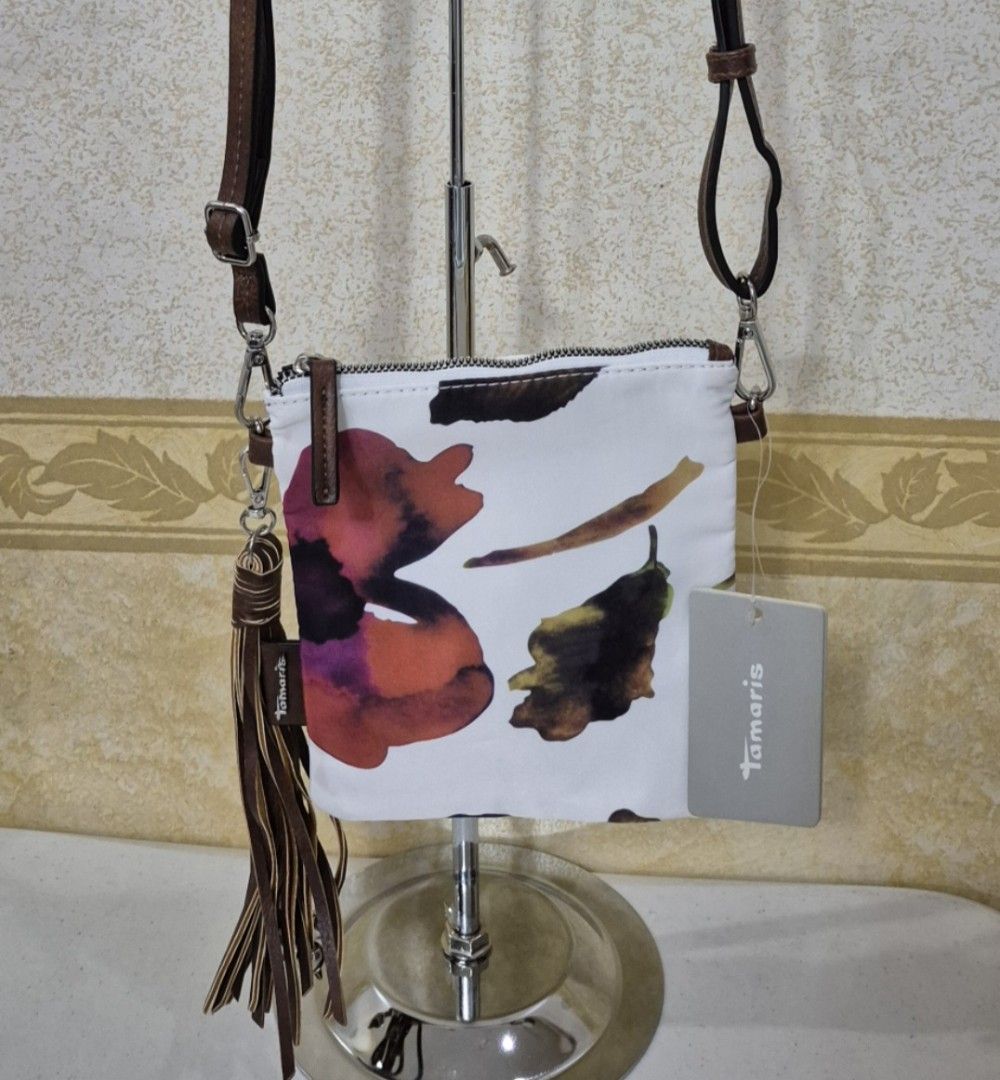 F12-450 Tamaris Forest Mini Sling Bag (Category: Cross-body Bags) located in Valenzuela. Submitted by dailyhappyfinds (Listing ID 1460787036, Image 1). Description: BRAND: Tamaris -Brand new with tag -Sling bag -With minimal stain -Please check last photo for details *Mall pullout/ factory pullout, please manage your expectations.