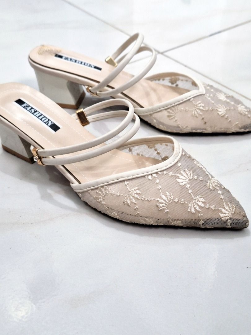 Fashion Lace Pointed Toe Mules with Double Strap (Category: Flats & Sandals) located in Quezon City. Submitted by camille_cr (Listing ID 1460730873, Image 1). Description: - Elegant cream-colored mules - Delicate lace overlay - Chic pointed toe - Comfortable low block heel - Secure double criss-cross straps - Easy slip-on style - Perfect for dressing up or down.