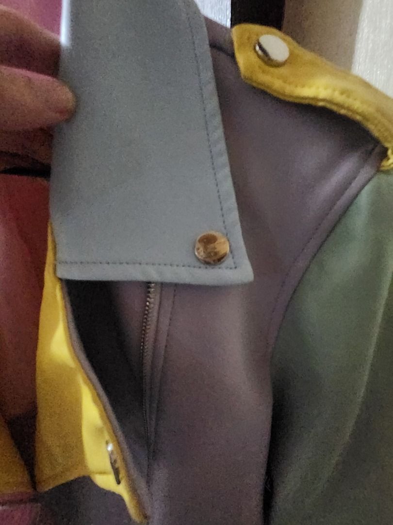 Faux Leather Moto Jacket (Category: Coats, Jackets and Outerwear) located in Manila. Submitted by oshangdeep (Listing ID 1460870358, Image 3). Description: - Eye-catching colorblock design with pink, purple, yellow, light blue, and green panels. - Made from durable faux leather. - Features a convenient zipper front closure. - Stylish button details on the collar and pockets. - A unique and bold statement piece to elevate any outfit..