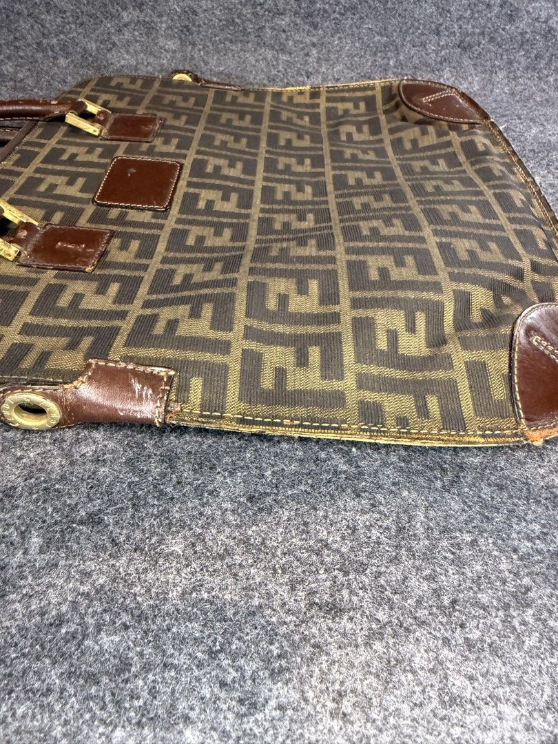 FENDI ZUCCA MONOGRAM FLAT HANDBAG (Category: Luxury Bags & Wallets) located in Taguig. Submitted by billsanity (Listing ID 1460857308, Image 3). Description: ⚠️ READ THE DESCRIPTION AND CHECK ALL PICS BEFORE INQUIRING ⚠️ ⚠️GRAB IT BEFORE IT’S GONE⚠️ ⚠️MINE MO NA BAKA MAUNAHAN KA PA MAGSISI KA PA ⚠️ FENDI ZUCCA MONOGRAM FLAT HANDBAG 💯💯💯 Money back guaranteed Rank AB Used but in presentable condition Bawal sa maarte! Selling low for PHP 6950 onl