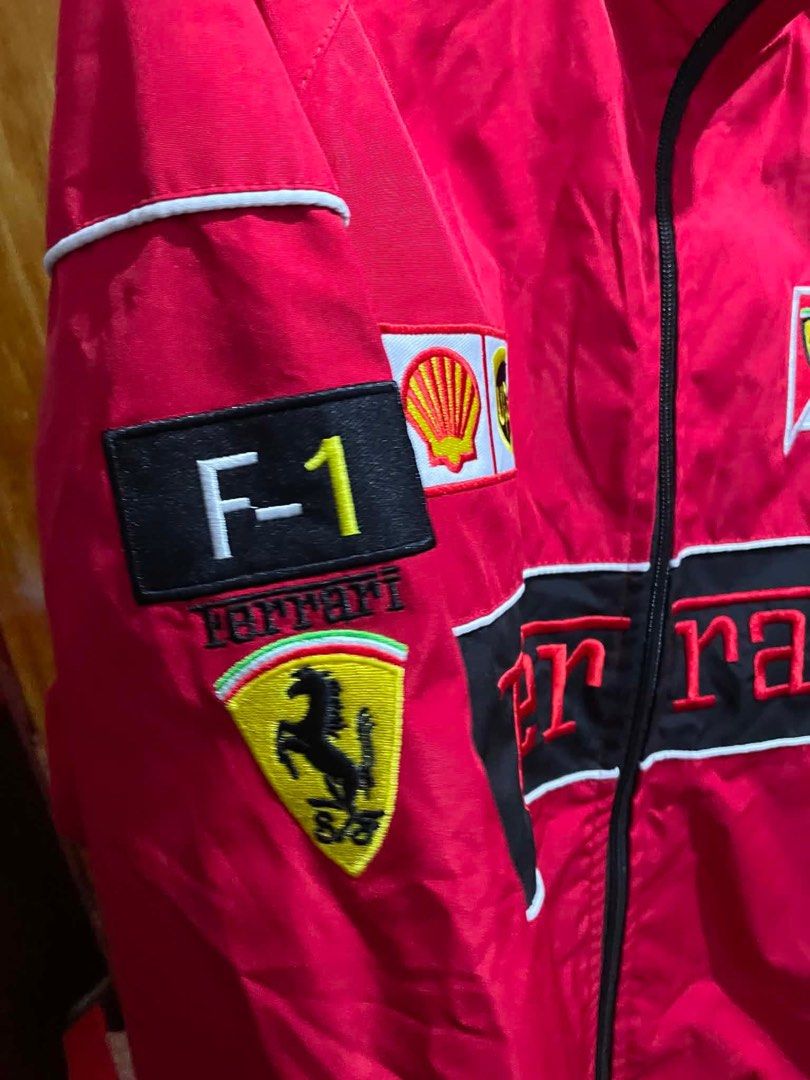 Ferrari F1 Racing Jacket (Category: Coats, Jackets and Outerwear) located in Antipolo. Submitted by noellemags (Listing ID 1460902177, Image 3). Description: - Red Ferrari F1 racing jacket from Fudgerock (bought for ₱1,800) - Used twice for events (both air conditioned) - Has lukot due to improper storage; no flaws.