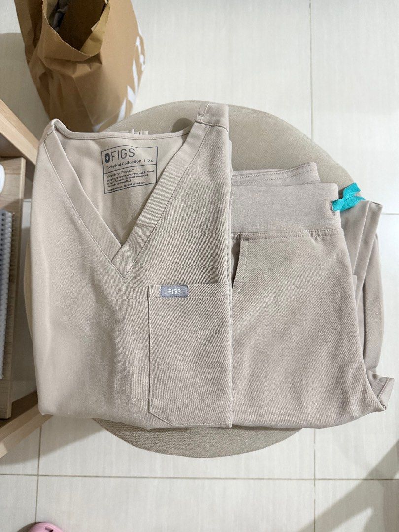 Figs XS Beige Boulder Set (Category: Others Tops) located in Manila. Submitted by stmofu_goods (Listing ID 1460829637, Image 1). Description: Figs Beige Boulder XS Set - Used Like New (Rarely worn) - Catarina Top XS - Yola Straight Pants XS MOD: Lbc or lalamove or grab Ortigas MOP: Bdo Gcash GoTyme.