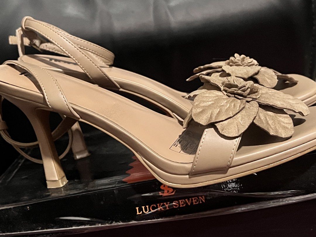 Fioni Beige Flower Heeled Sandals (Category: Flats & Sandals) located in Manila. Submitted by charlotte.mae (Listing ID 1460791593, Image 1). Description: - Cute beige heeled sandals by Fioni - Pretty flower detail on the front strap - Secure ankle strap for a comfortable fit - Comfortable heel height, perfect for dressing up any outfit .