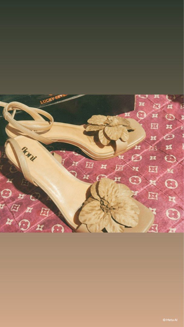 Fioni Beige Flower Heeled Sandals (Category: Flats & Sandals) located in Manila. Submitted by charlotte.mae (Listing ID 1460791593, Image 3). Description: - Cute beige heeled sandals by Fioni - Pretty flower detail on the front strap - Secure ankle strap for a comfortable fit - Comfortable heel height, perfect for dressing up any outfit .