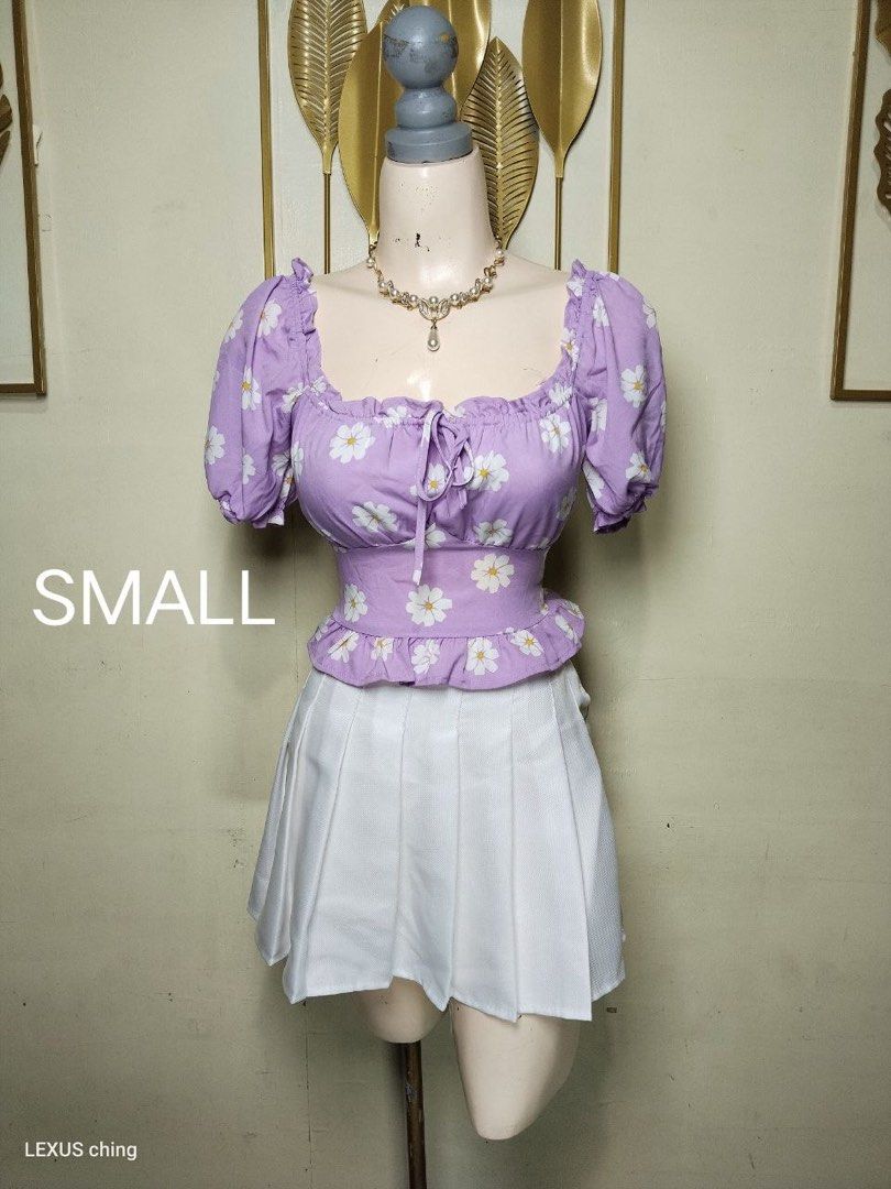 Floral puff sleeves top (Category: Blouses) located in Caloocan City. Submitted by itsmezhel15 (Listing ID 1460726717, Image 1). Description: Floral lavander puff sleeves top Small-medium size Like new condition Zipper at side .