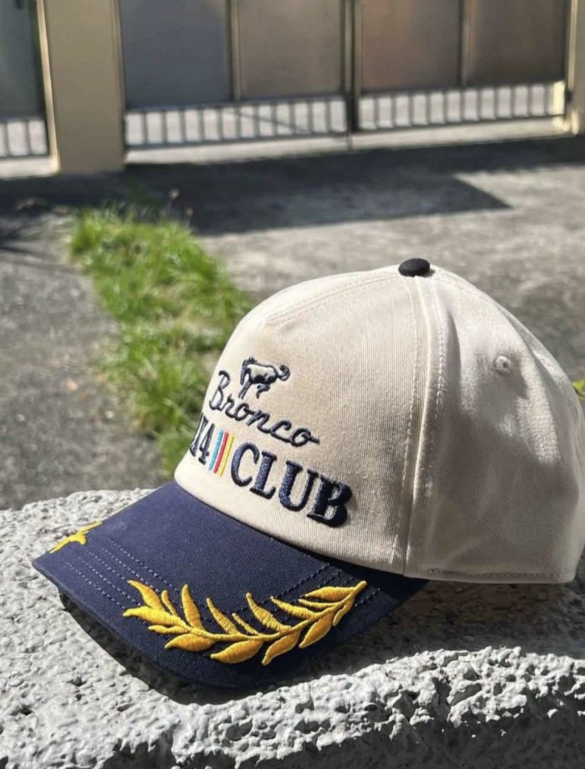 Original Ford Bronco 4x4 Club Hat (Category: Caps & Hats) located in Malabon City. Submitted by btstlouie (Listing ID 1460724304, Image 2). Description: - Cool Ford Bronco cap - Features 'Bronco 4x4 Club' embroidery with a horse graphic - Navy blue brim with stylish gold leaf accents - Tag shows official Ford Motor Company and American Needle Inc. branding - Perfect for any Ford Bronco enthusiast or collector PS. issue indicated on pic .
