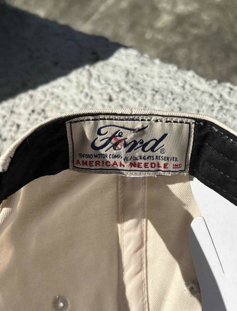 Original Ford Bronco 4x4 Club Hat (Category: Caps & Hats) located in Malabon City. Submitted by btstlouie (Listing ID 1460724304, Image 3). Description: - Cool Ford Bronco cap - Features 'Bronco 4x4 Club' embroidery with a horse graphic - Navy blue brim with stylish gold leaf accents - Tag shows official Ford Motor Company and American Needle Inc. branding - Perfect for any Ford Bronco enthusiast or collector PS. issue indicated on pic .
