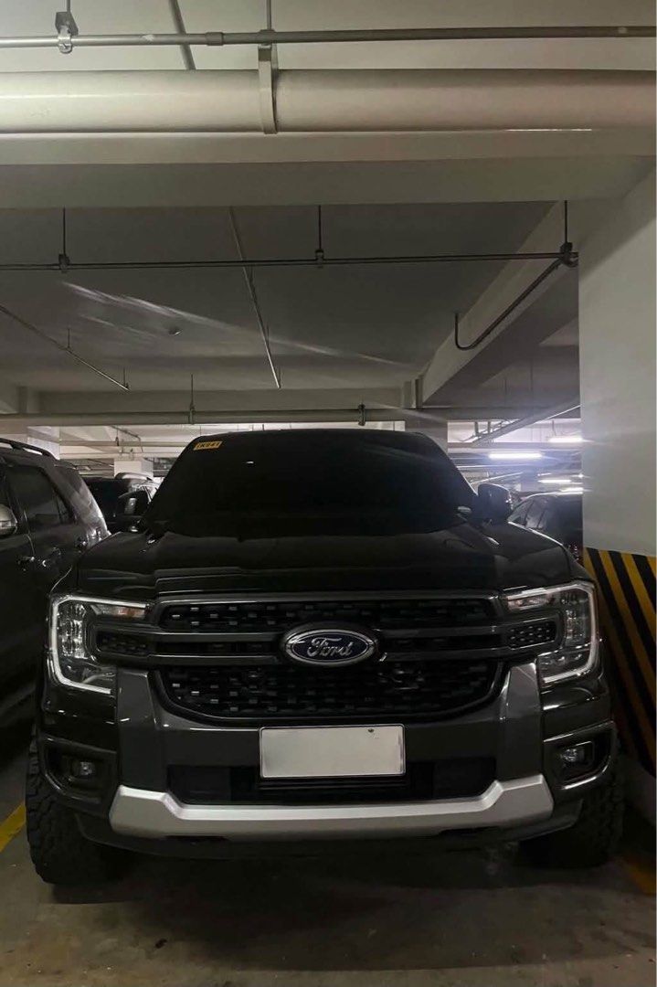 Ford Ranger (Category: Used Cars) located in Pasay City. Submitted by acocloset (Listing ID 1460860057, Image 2). Description: For Sale! Ford Ranger Sport 4x2 2023 1st owner | Brand new condition Casa maintained at Ford Q.ave 14k mileage only Rays TE37 | BF Goodrich With roller lid and genuine leather seat cover RFS : Upgrade ₱ 1.450M.