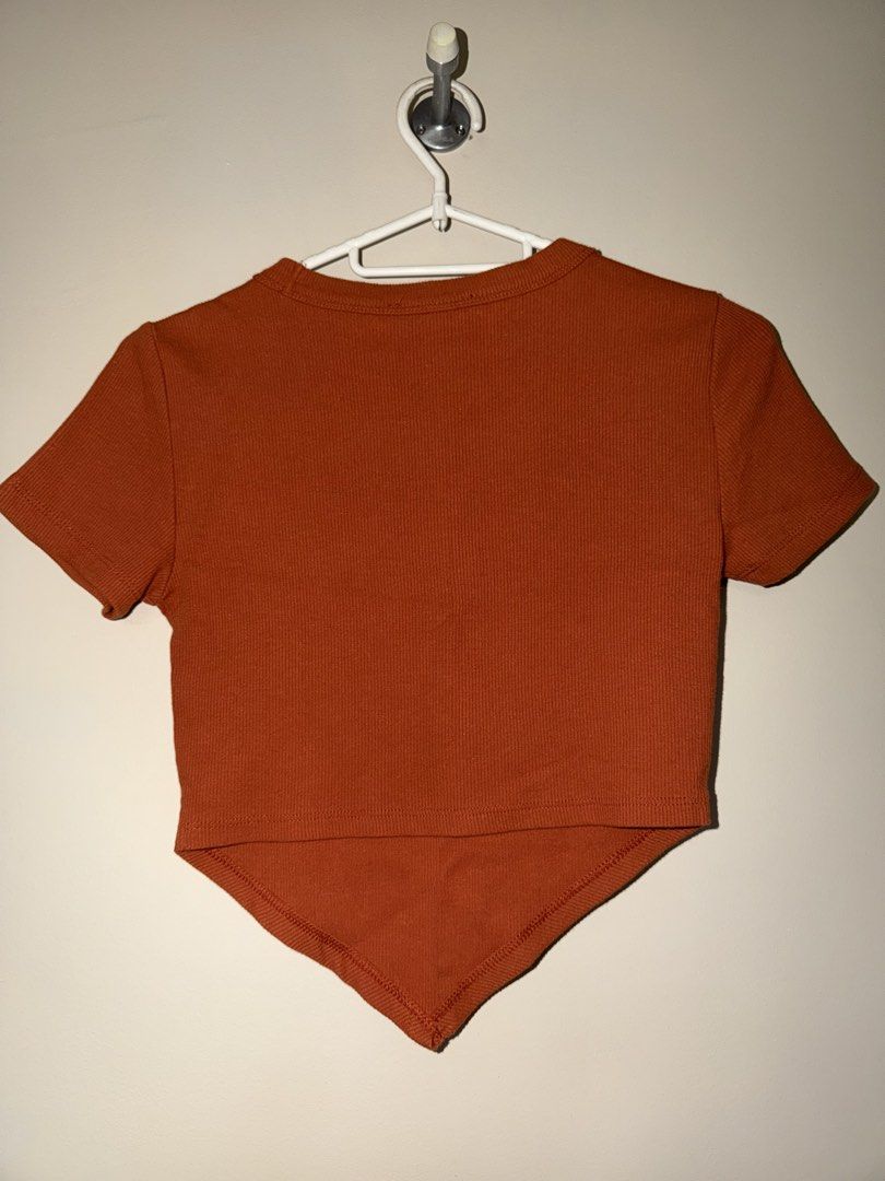 Forever 21 Orange Crop Top (Category: Shirts) located in Binan City. Submitted by jaewinhaul (Listing ID 1460778185, Image 2). Description: - Location: Biñan City, Laguna - Model picture for reference only - Good condition, no flaws :) - Payment; Gcash.
