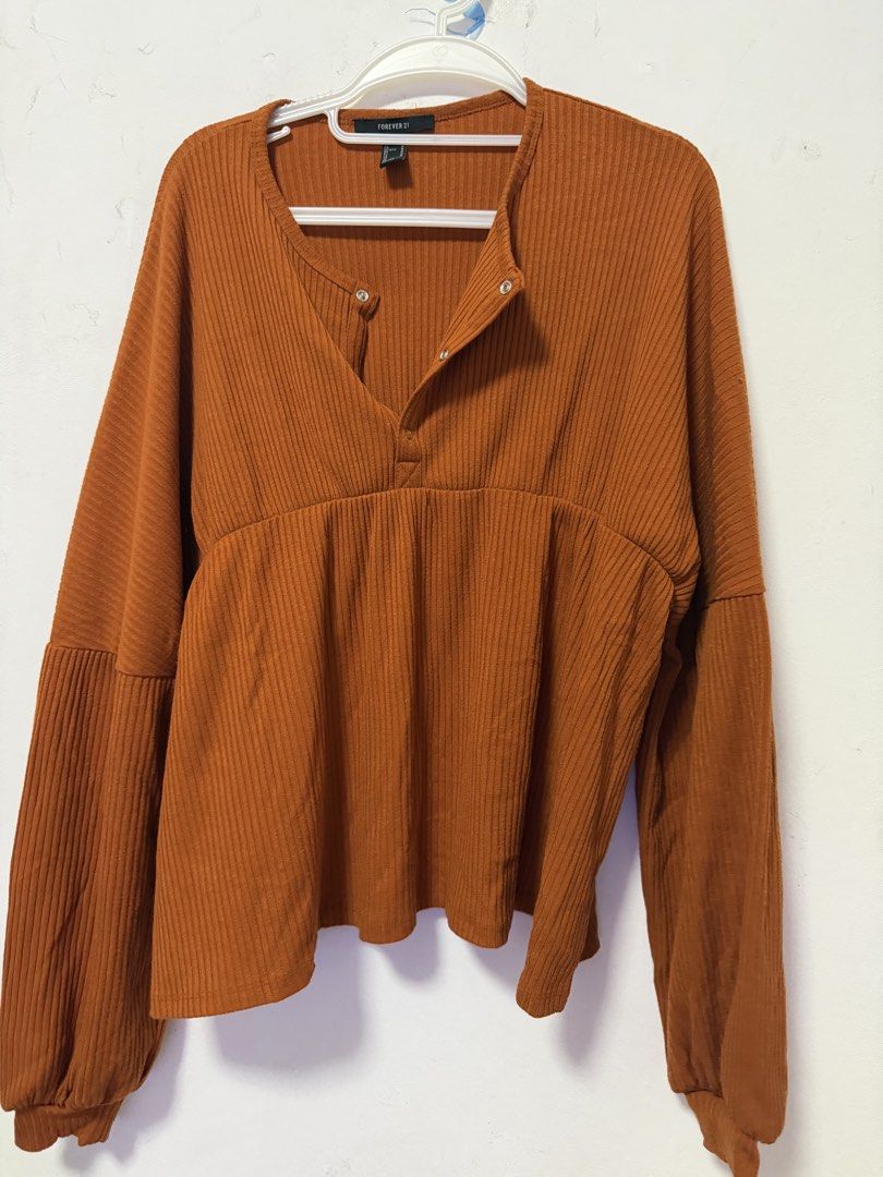 Forever 21 Ribbed Long Sleeve Top (Category: Longsleeves) located in Paranaque City. Submitted by zen.dycluttering (Listing ID 1460864864, Image 1). Description: - Orange ribbed long sleeve top - Brand: Forever 21 - Style: Oversized Long Sleeve - Size: Medium (M) in tag but fits Large to XL.