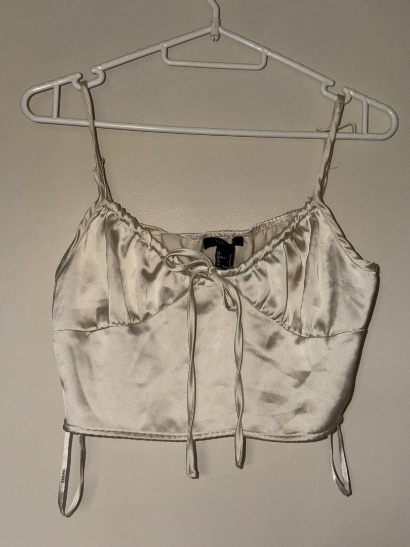 Forever 21 Satin Sleeveless Crop Top (Category: Others Tops) located in Binan City. Submitted by jaewinhaul (Listing ID 1460795006, Image 1). Description: - Model for reference only - Size: Small - Location: Biñan City, Laguna - Payment: Gcash.